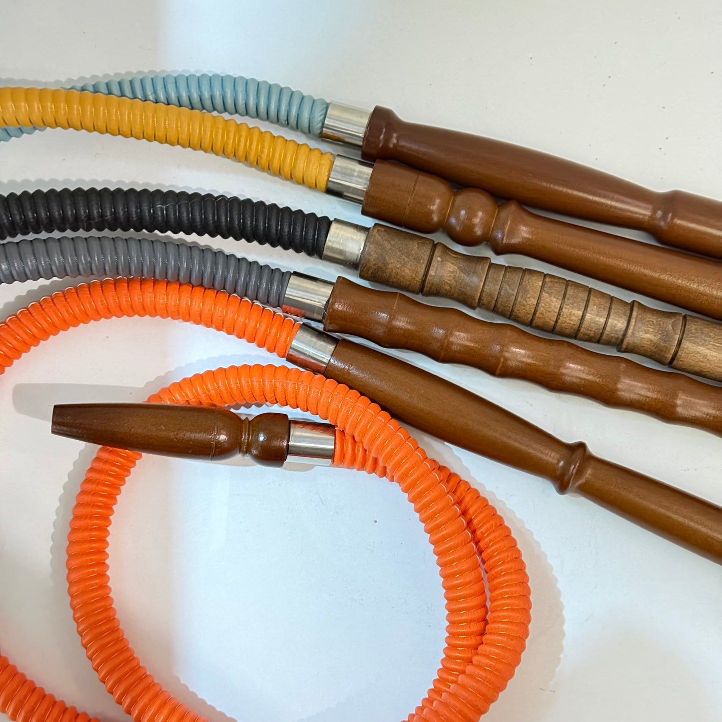 Traditionelle Schläuche mit Holzmundstück